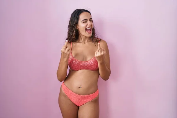 Young Hispanic Woman Wearing Lingerie Pink Background Showing Middle Finger — Stock Photo, Image