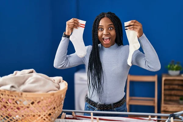 African American Woman Holding Socks Celebrating Crazy Amazed Success Open — Zdjęcie stockowe