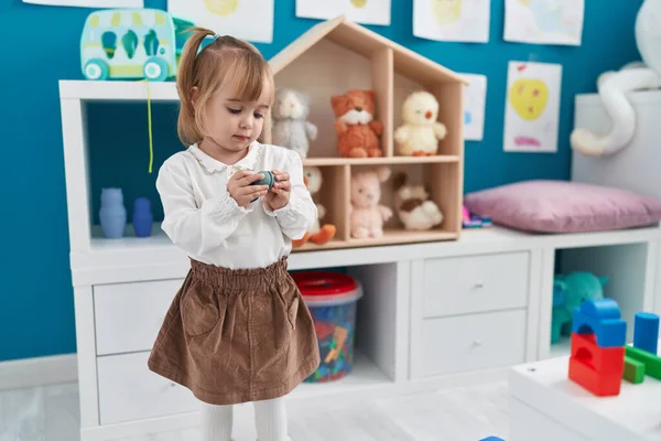 Adorable Blonde Girl Holding Toy Standing Kindergarten — Stock Photo, Image