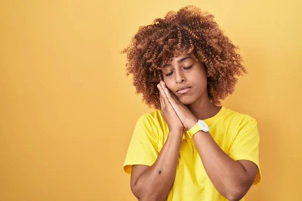 Young Hispanic Woman Curly Hair Standing Yellow Background Sleeping Tired —  Fotos de Stock