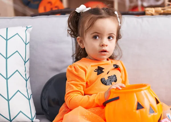 Adorable Hispanic Toddler Having Halloween Party Sitting Sofa Home — Stok fotoğraf