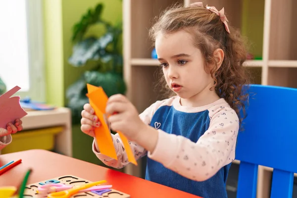 Adorable Blonde Girl Student Cutting Paper Kindergarten — Stok fotoğraf