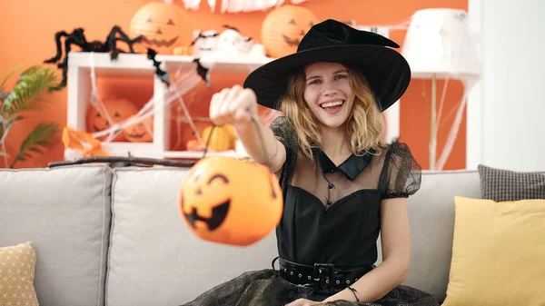 Young Blonde Woman Wearing Halloween Costume Holding Pumpkin Basket Home — Fotografia de Stock