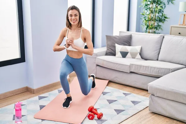 Young Beautiful Hispanic Woman Smiling Confident Training Leg Exercise Home —  Fotos de Stock