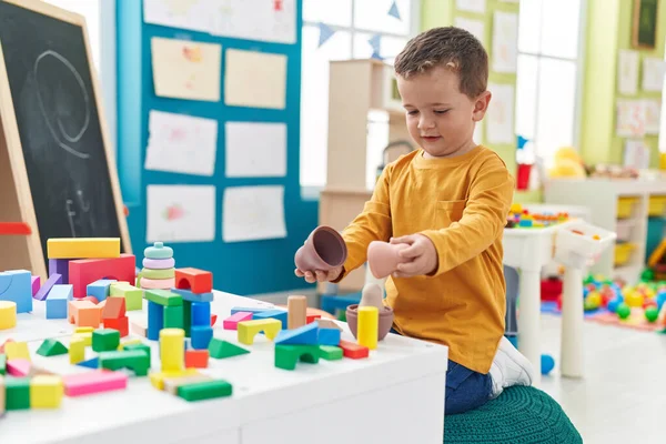 Adorable Caucasian Boy Playing Toys Sitting Floor Kindergarten — Φωτογραφία Αρχείου