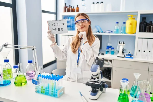 Young Blonde Scientist Woman Working Cruelty Free Laboratory Serious Face — 图库照片
