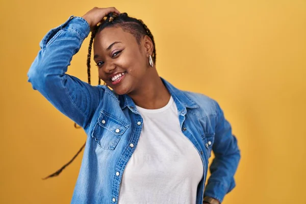 African American Woman Braids Standing Yellow Background Smiling Confident Touching —  Fotos de Stock