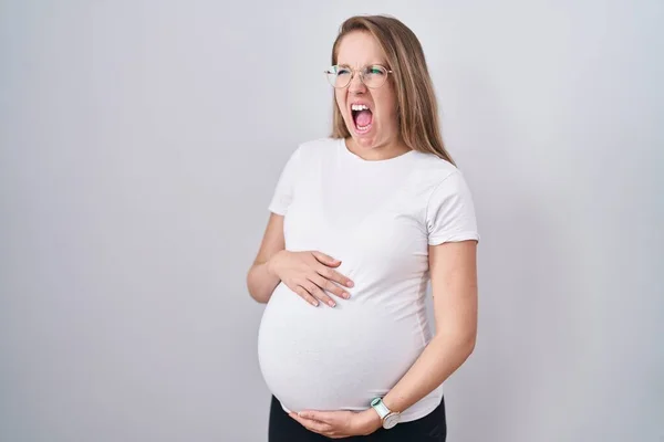 Young Pregnant Woman Expecting Baby Touching Pregnant Belly Angry Mad — Stock fotografie