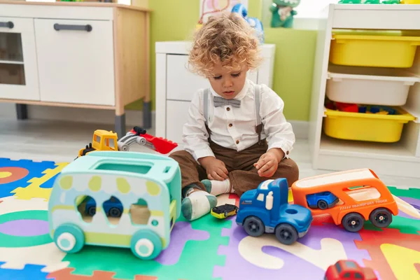 Adorable Blond Toddler Playing Cars Toy Sitting Floor Kindergarten — Stock Photo, Image