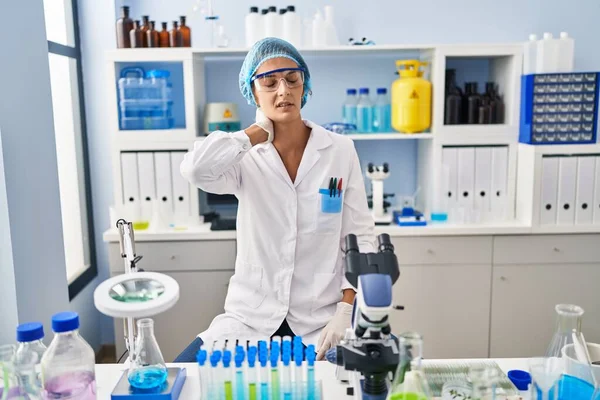 Brunette Woman Working Scientist Laboratory Suffering Neck Ache Injury Touching — Stock Photo, Image