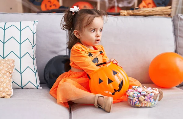 Adorable Hispanic Toddler Having Halloween Party Holding Sweets Home — Stok fotoğraf