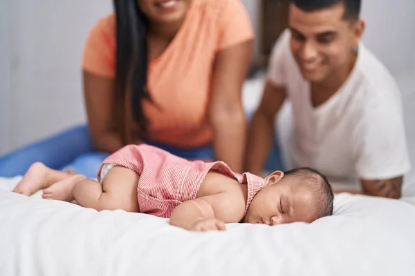 Hispanic Family Looking Baby Lying Bed Bedroom — Stock Photo, Image