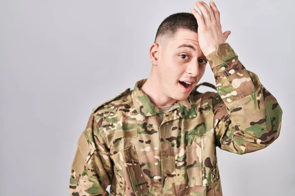 Young Man Wearing Camouflage Army Uniform Surprised Hand Head Mistake — Foto de Stock