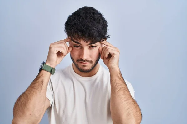 Hispanic Man Beard Standing White Background Trying Open Eyes Fingers — Stockfoto