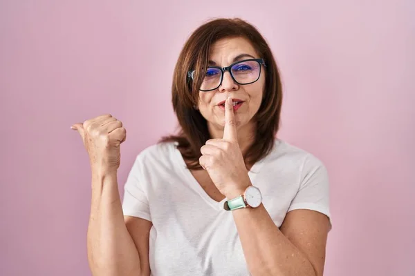 Middle Age Hispanic Woman Standing Pink Background Asking Quiet Finger — Stock Photo, Image