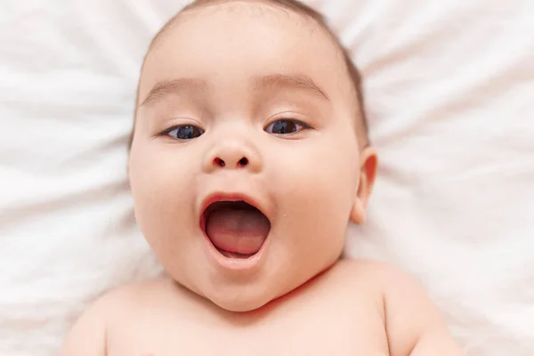 Adorable Hispanic Toddler Smiling Confident Lying Bed Bedroom — Fotografia de Stock