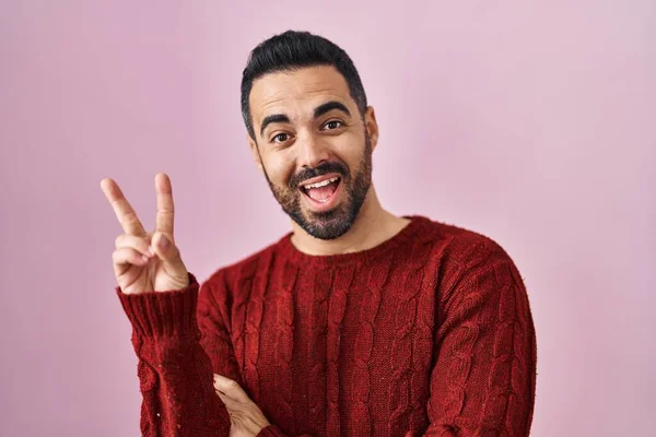 Young Hispanic Man Beard Wearing Casual Sweater Pink Background Smiling — Stockfoto