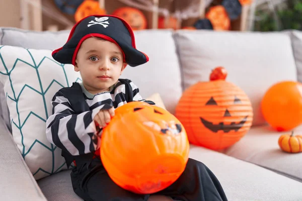 Adorable Hispanic Boy Having Halloween Party Holding Pumpkin Basket Home — Foto de Stock