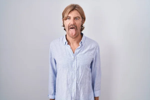 Caucasian Man Mustache Standing White Background Sticking Tongue Out Happy — Stockfoto