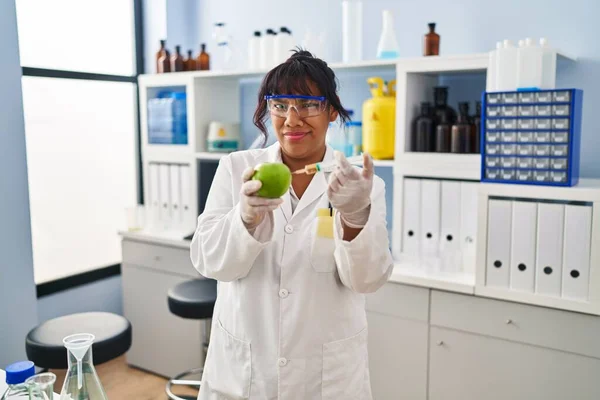 Hispanic Woman Working Scientist Laboratory Apple Clueless Confused Expression Doubt — Stockfoto