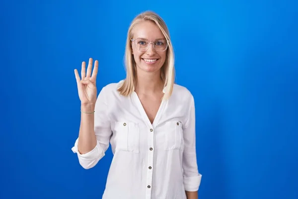Young Caucasian Woman Standing Blue Background Showing Pointing Fingers Number — Stock fotografie