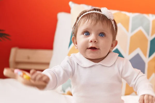 Adorable Blonde Baby Holding Toy Sitting Bed Bedroom — Stock Photo, Image