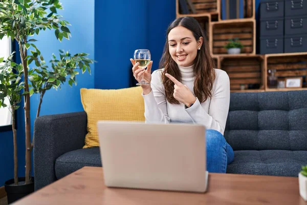 Young Hispanic Woman Doing Video Call Drinking White Wine Smiling — ストック写真
