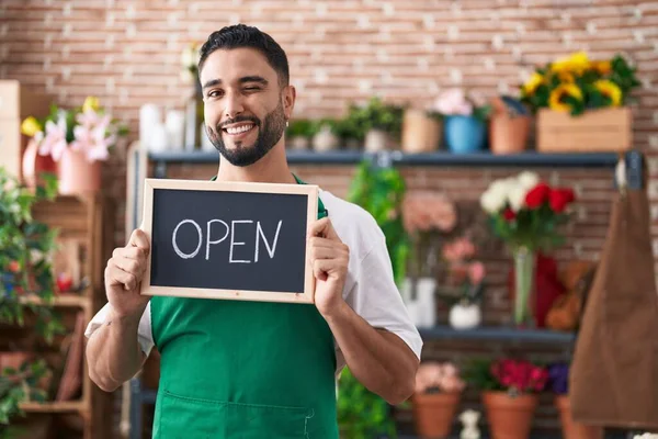 Hispanic Young Man Working Florist Holding Open Sign Winking Looking — Foto Stock