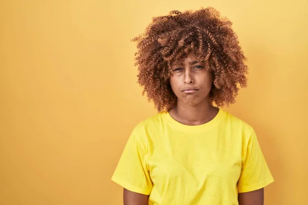 Young Hispanic Woman Curly Hair Standing Yellow Background Skeptic Nervous — Fotografia de Stock