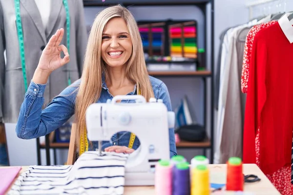 Blonde Woman Dressmaker Designer Using Sew Machine Smiling Positive Doing — 图库照片