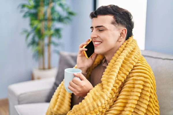 Young Non Binary Man Talking Smartphone Drinking Coffee Home — Stockfoto