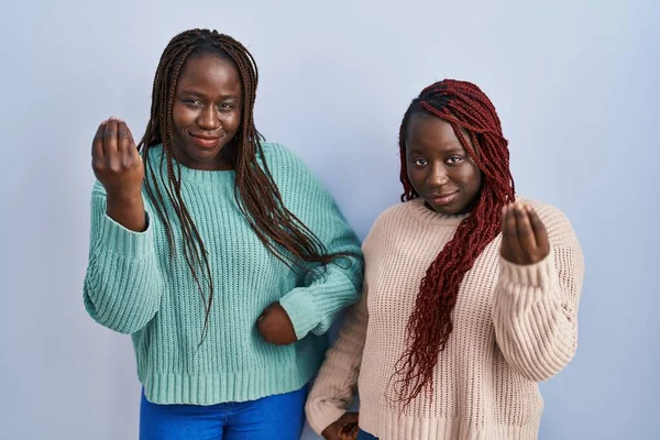 Two African Woman Standing Blue Background Doing Italian Gesture Hand — ストック写真