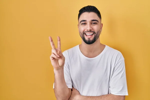 Young Handsome Man Wearing Casual Shirt Yellow Background Smiling Happy — Stockfoto
