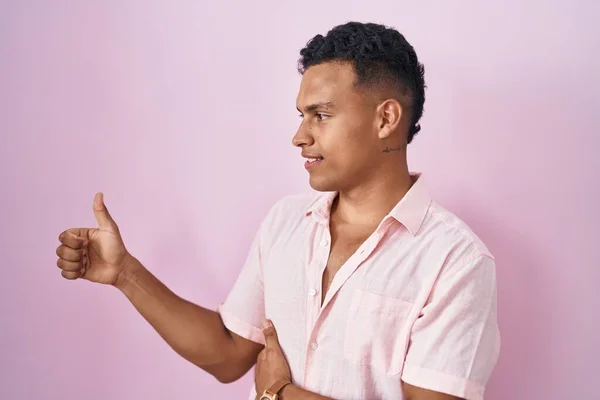 Young Hispanic Man Standing Pink Background Looking Proud Smiling Doing — ストック写真