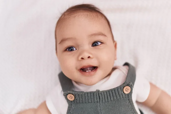 Adorable Hispanic Toddler Smiling Confident Lying Bed Bedroom — Stok fotoğraf
