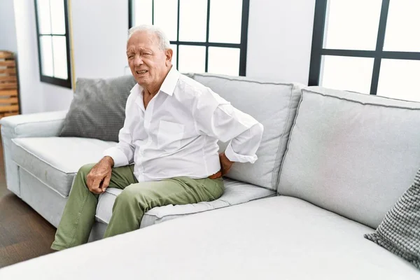 Senior Man Suffering Backache Sitting Sofa Home — Fotografia de Stock