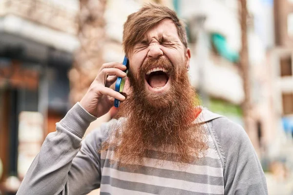 Young Redhead Man Talking Smartphone Shouting Street — Stock Photo, Image