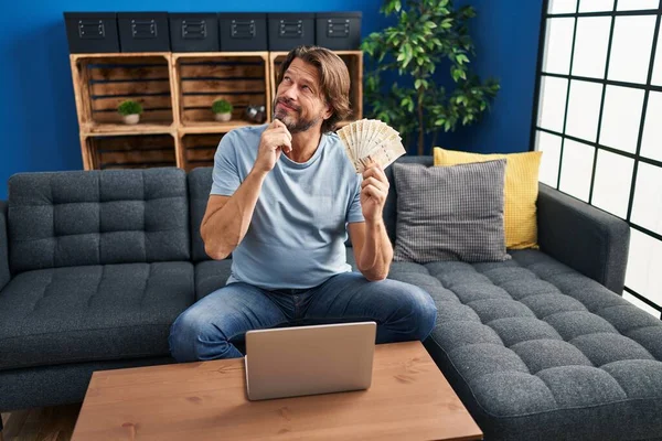 Handsome Middle Age Man Holding 100 Danish Krone Banknotes Using — Stockfoto