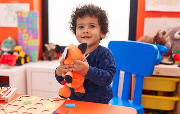 Adorable Hispanic Toddler Smiling Confident Holding Toy Kindergarten — ストック写真