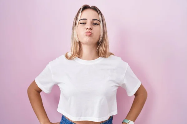 Young Blonde Woman Standing Pink Background Puffing Cheeks Funny Face — 스톡 사진
