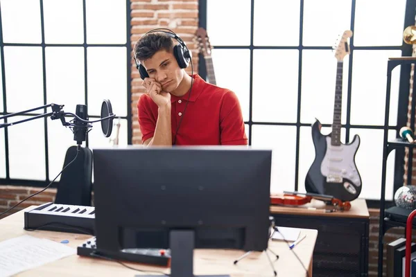 Young Hispanic Man Playing Piano Keyboard Music Studio Thinking Looking — Fotografia de Stock