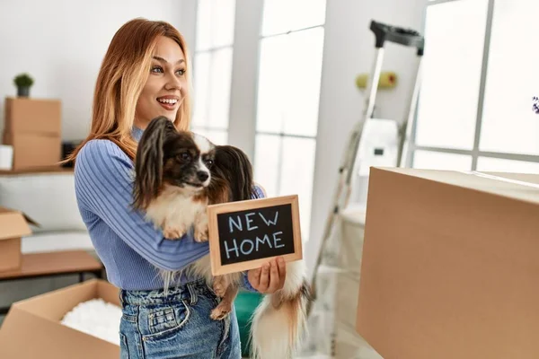 Young Caucasian Woman Holding Blackboard Hugging Dog New Home — 图库照片