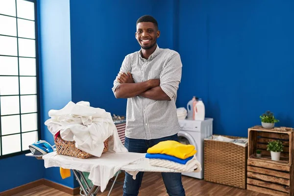 African American Man Ironing Clothes Home Happy Face Smiling Crossed — Foto de Stock