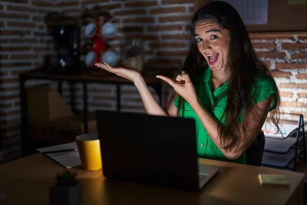Young Teenager Girl Working Office Night Amazed Smiling Camera While — Stockfoto