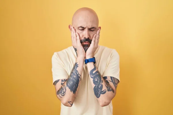Hispanic Man Tattoos Standing Yellow Background Tired Hands Covering Face — Stock Photo, Image
