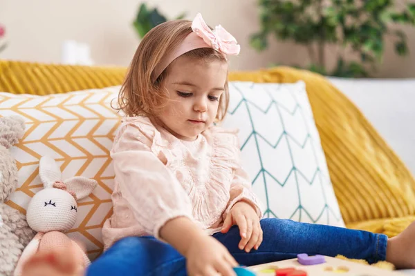 Adorable Blonde Toddler Playing Maths Puzzle Game Sitting Sofa Home — Stock Photo, Image