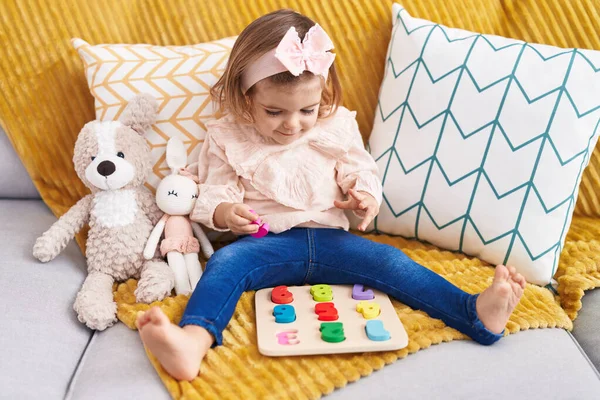 Adorable Blonde Toddler Playing Maths Puzzle Game Sitting Sofa Home — Stock Photo, Image