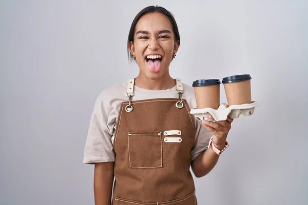 Young Hispanic Woman Wearing Professional Waitress Apron Holding Coffee Sticking — Zdjęcie stockowe
