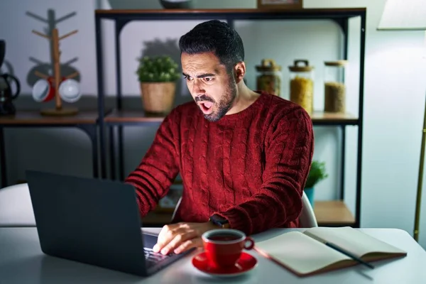 Young Hispanic Man Beard Using Computer Laptop Night Home Shock — Stock fotografie