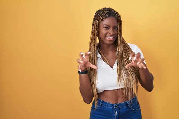 African American Woman Braided Hair Standing Yellow Background Smiling Funny — Stockfoto
